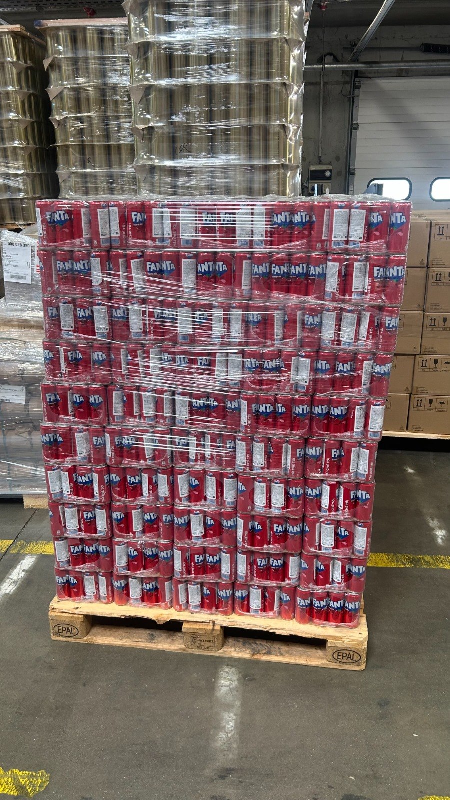 Wrapped pallet of Fanta cans in stock